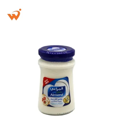 Almarai Spreadable Cream Cheese 200gm tub with smooth white cheese texture and iconic blue and green branding.