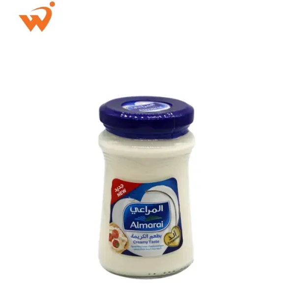 Almarai Spreadable Cream Cheese 200gm tub with smooth white cheese texture and iconic blue and green branding.