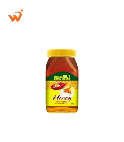 Dabur Honey 250gm glass jar with a gold-colored lid and a label showing a honey dipper and fresh honeycomb.