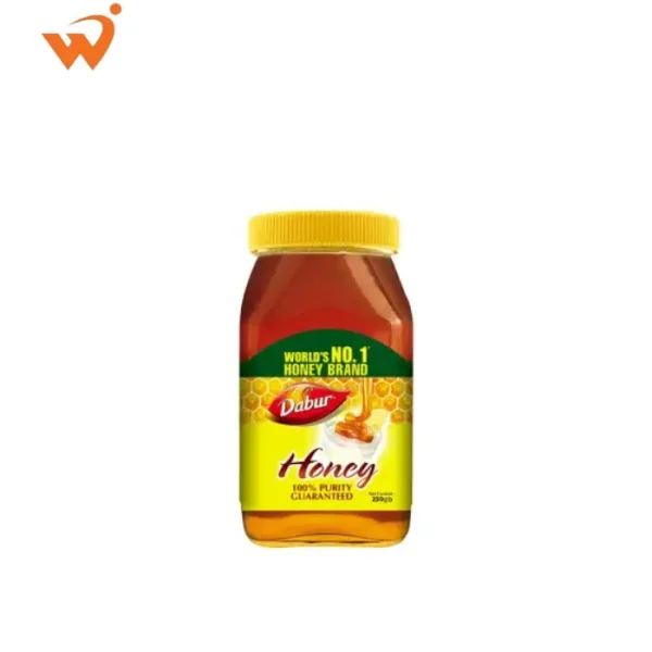 Dabur Honey 250gm glass jar with a gold-colored lid and a label showing a honey dipper and fresh honeycomb.