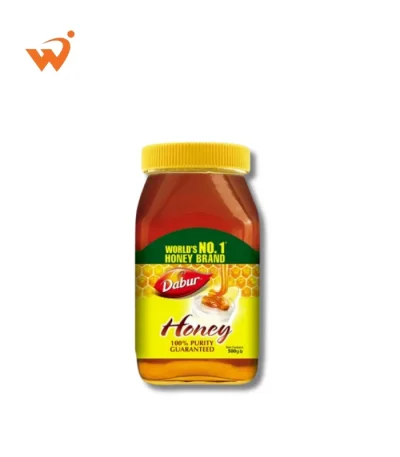 Dabur Honey 500gm medium-sized glass jar featuring the iconic Dabur branding and a clear view of the deep amber-colored honey.