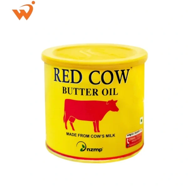 Red Cow Butter Oil 400gm premium red and yellow tin showing a rich golden liquid texture and the iconic Red Cow logo.